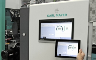 Der Karl Mayer-Stand wird auf der diesjährigen ITMA schon nach kurzer Messelaufzeit zum Meetingpoint der Wirkerei- und Kettvorbereitungsindustrie...