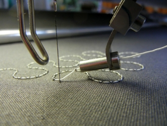 Embroidered appliqué featuring the functionalised E-thread (photo: with LEDs) for the analysis of processing parameters Photo: STFI